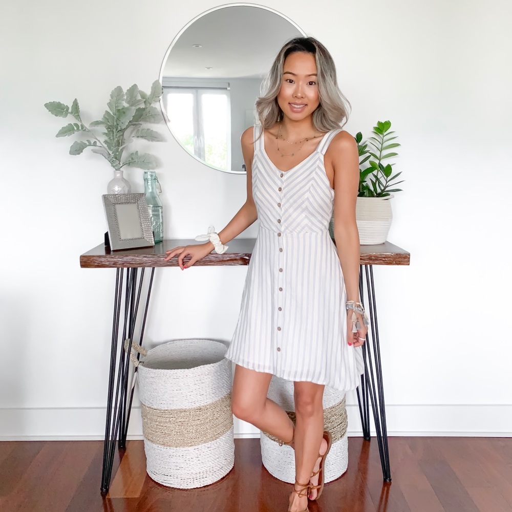 Blue and cream striped dress with black detailing